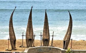 Totora reed rafts drying on beach